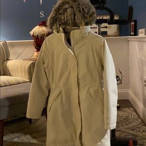 White North Face winter parka.